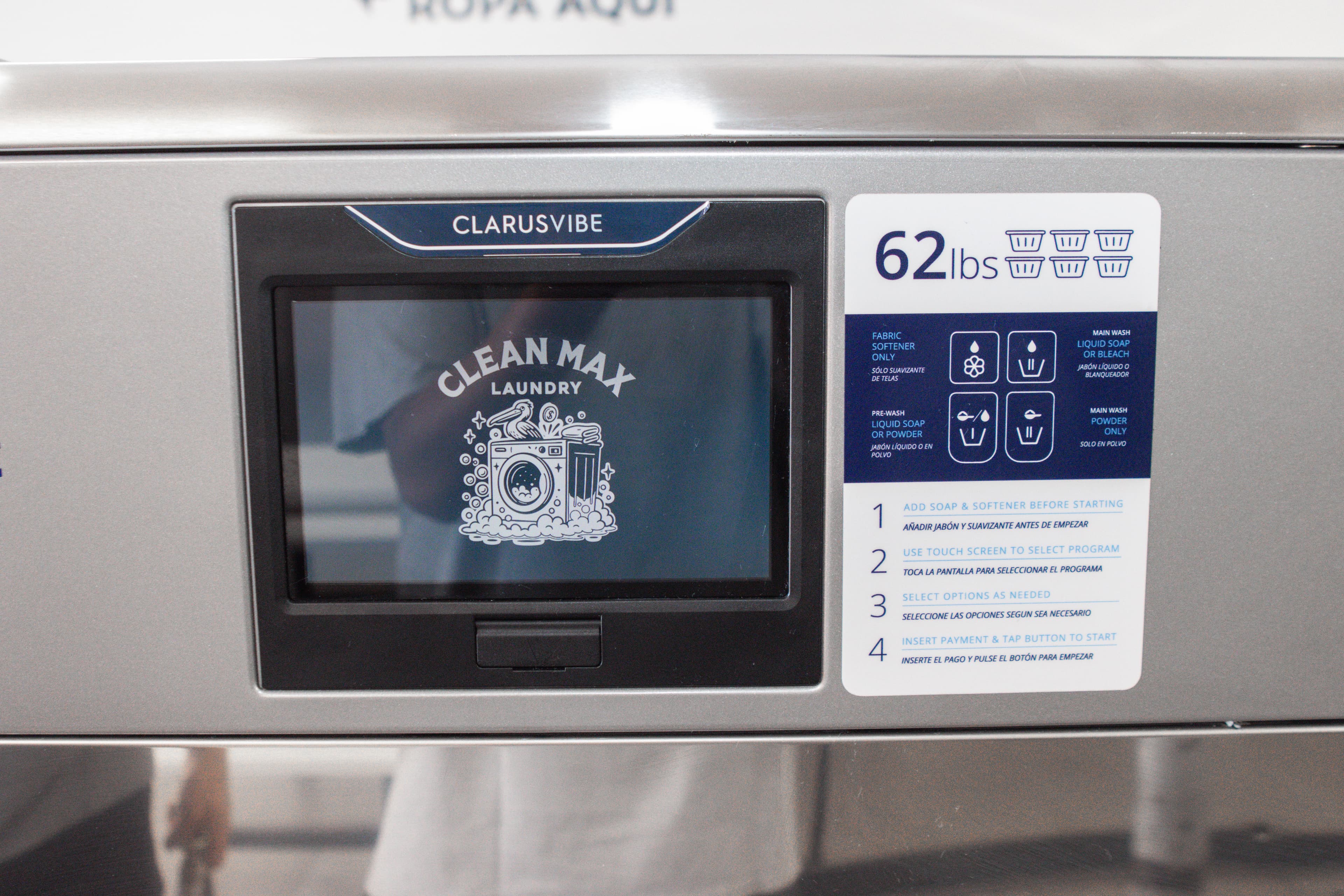 ClariVibe touchscreen showing CleanMax Laundry logo